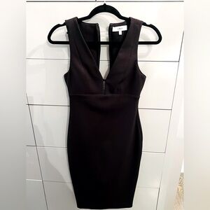 NWOT Likely fitted dress with back cut outs and deep v front.